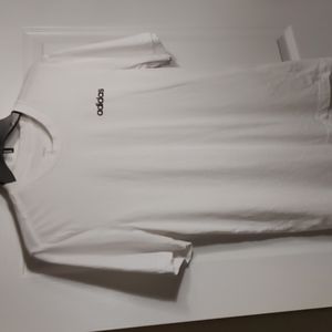 An Adidas size small white with black writing men's shirt
